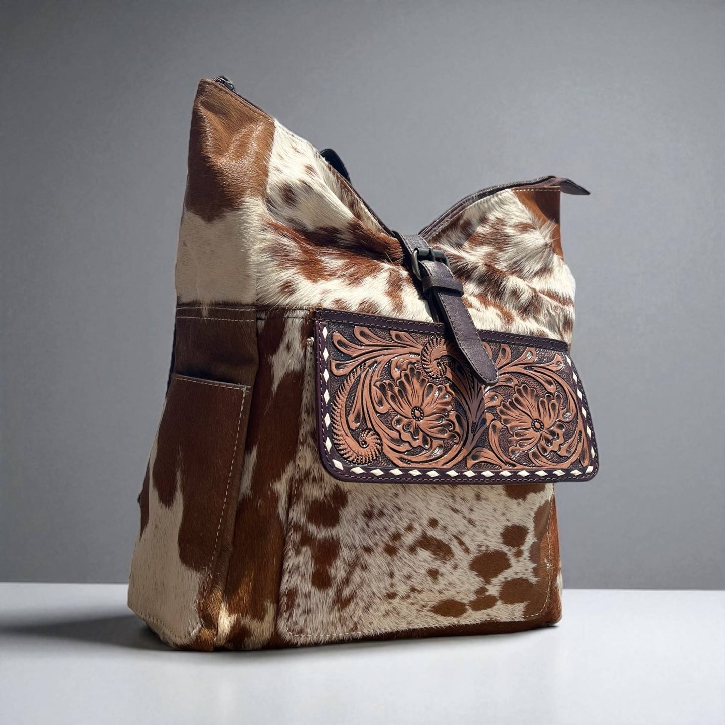 Rodeo tooled leather & cowhide backpack
