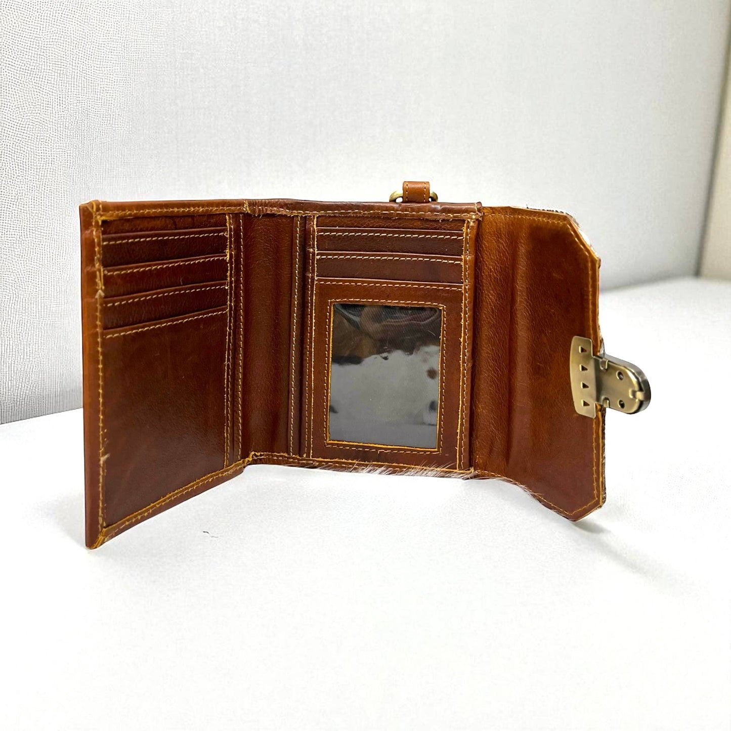 Checker tooled leather wristlet wallet