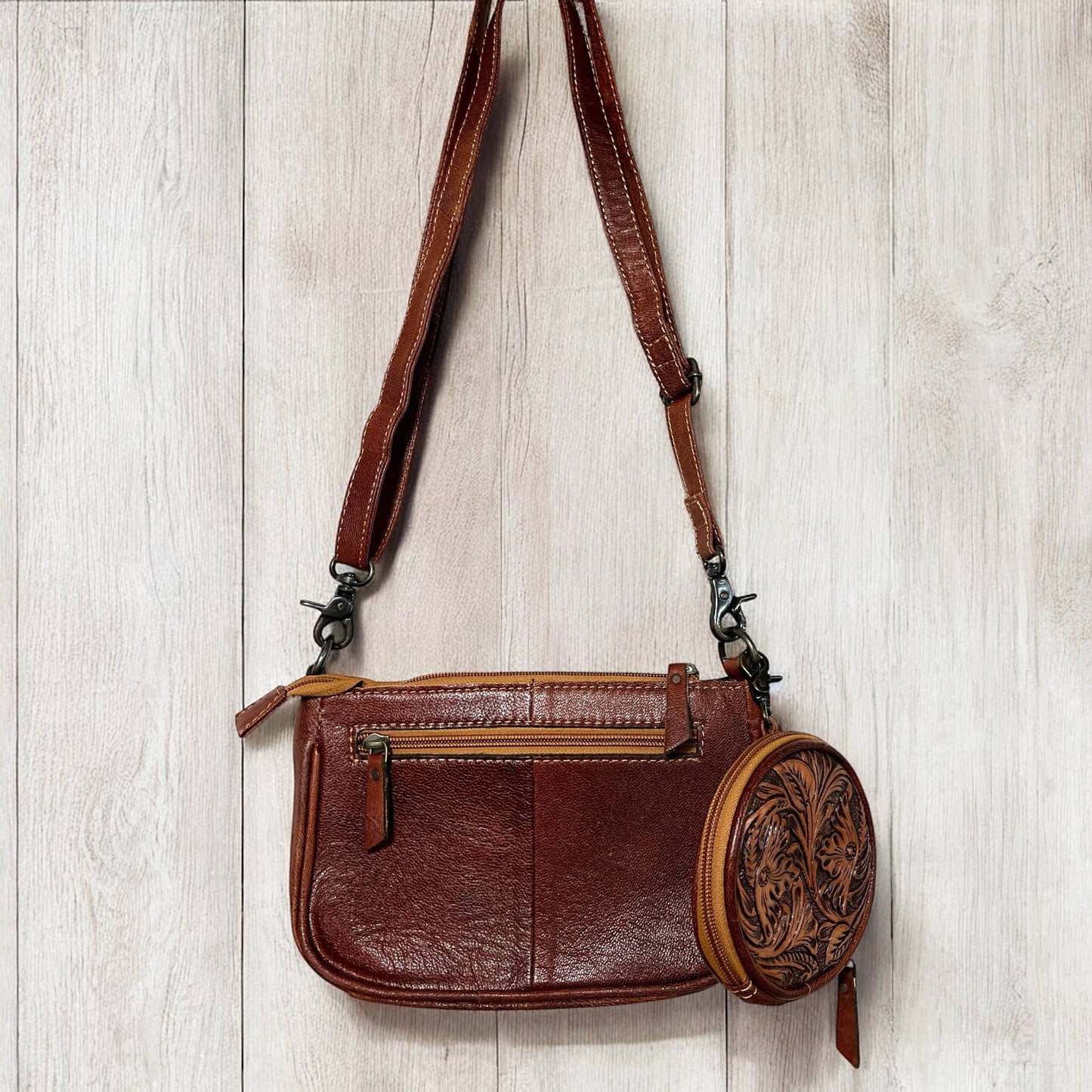 Tan tooled leather crossbody bag