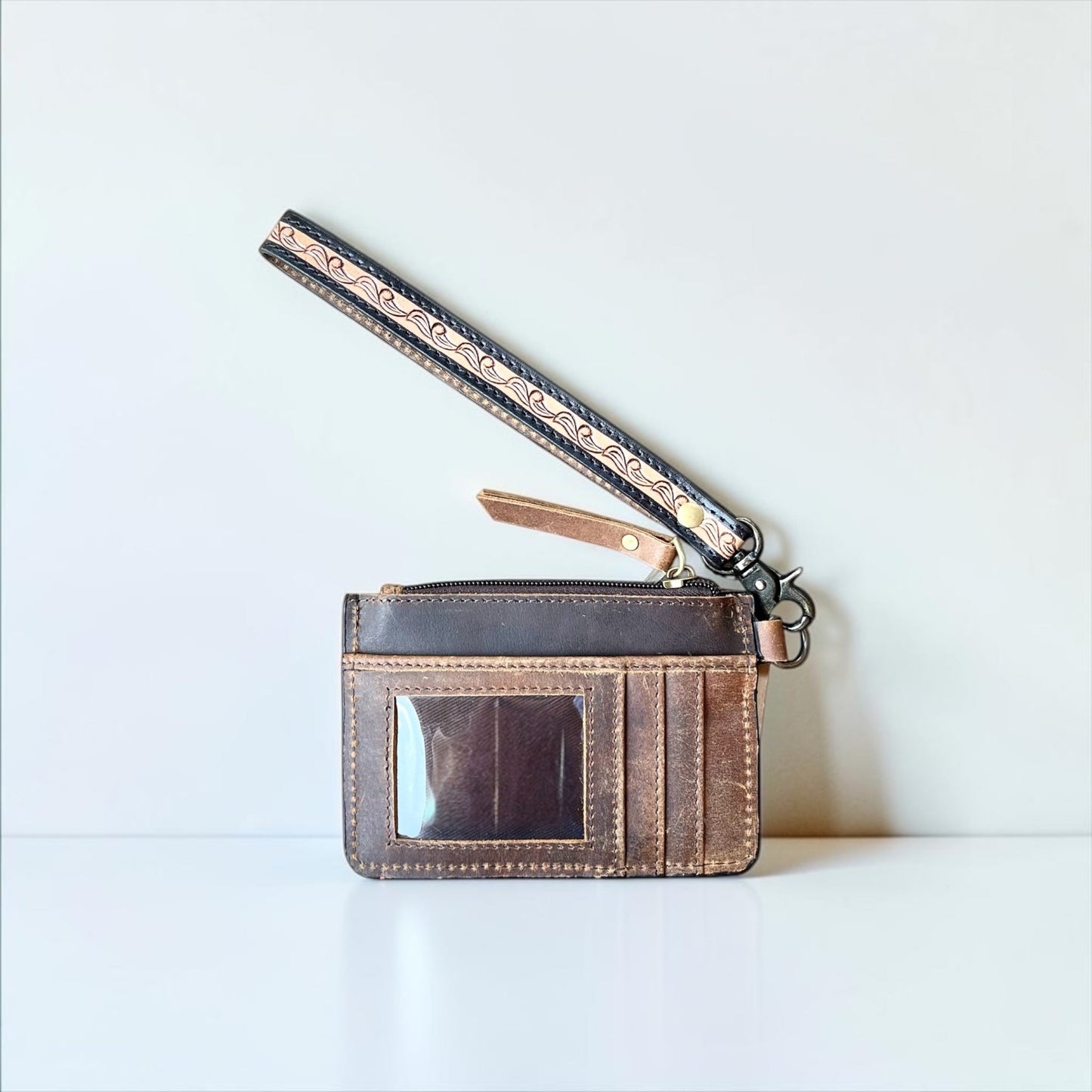 Pink tooled wristlet